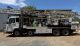 Bournedrill 1250 Drill Rig Mounted on 1998 Volvo FL10 8x4 Truck + 2009 Volvo FM MK2 8x4 Crane Support Truck with Drill Pipe, Water Tank & Mud Pump Package ($675,000 ex GST) (sale-ehub4319)